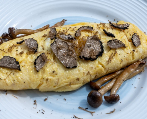 French,Omelette,With,Mushrooms,,Fresh,Farmers,Chicken,Eggs,And,Black